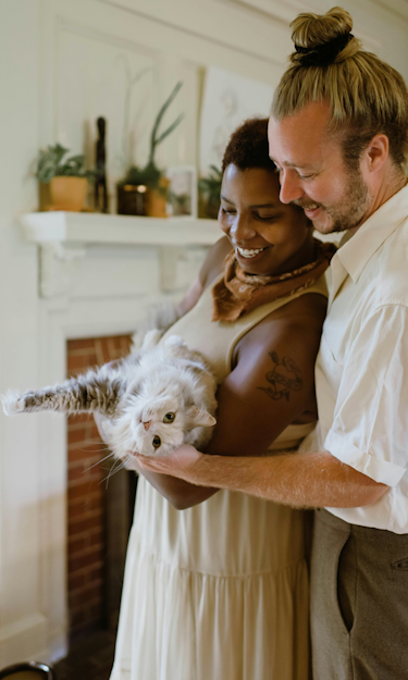 couple and their cat