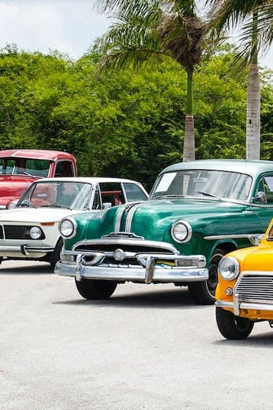 Classic cars parked on an open parking place