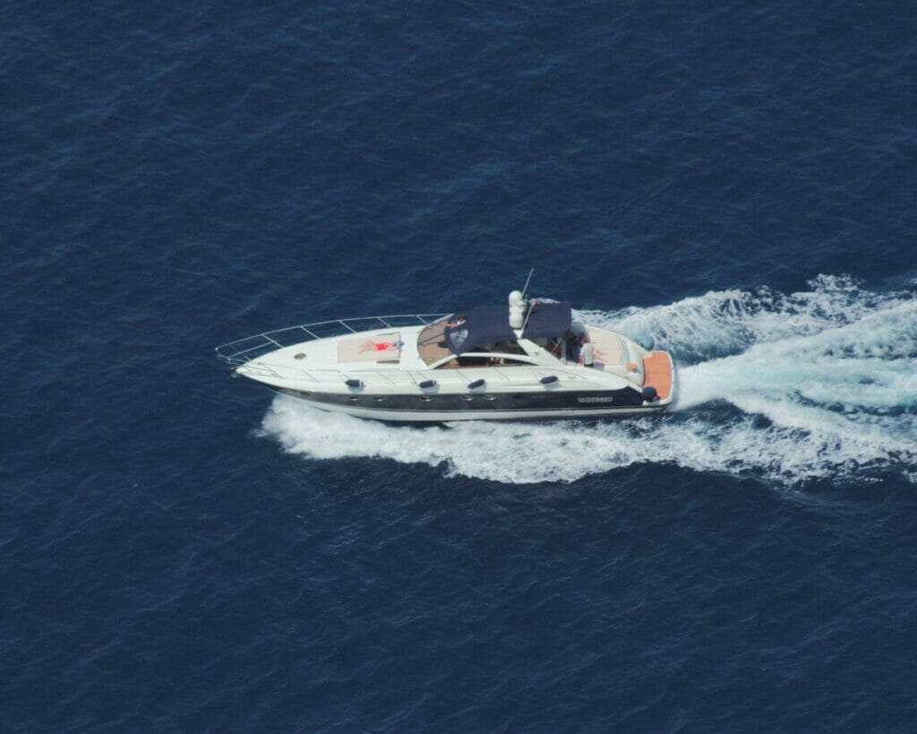 Aerial view, motor boat, ocean.